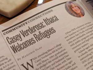 Newspaper story headlined "Casey Verderosa: Ithaca Welcomes Refugees"